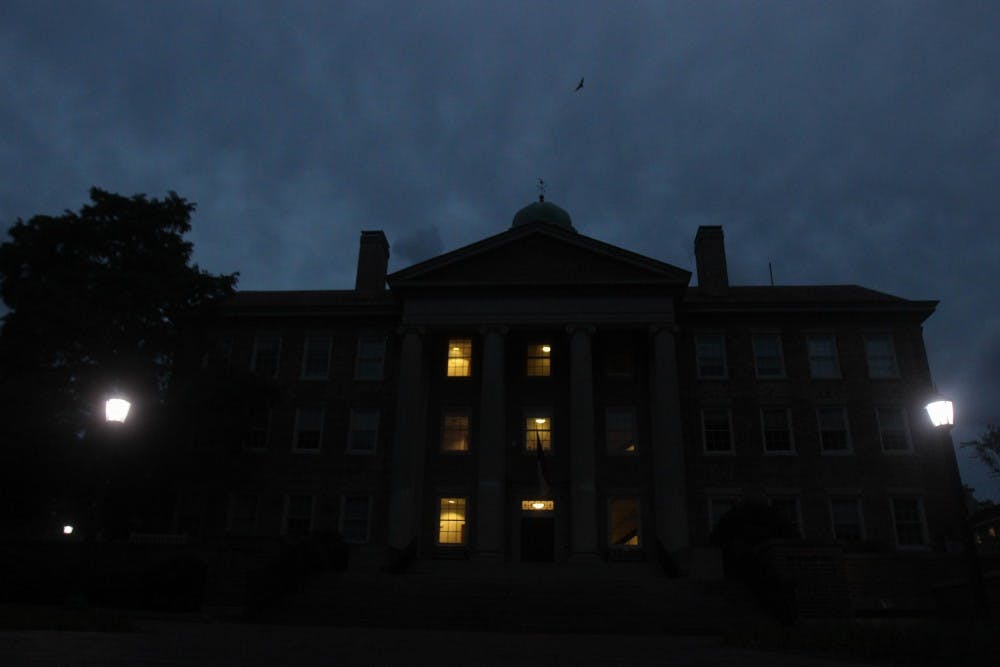 <p>Few windows are lit in South Building in the evenings.</p>