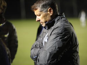 UNC Head Coach Carlos Somoano talks to reporters following UNC's loss to JMU in the second round of the NCAA Tournament Sunday, Nov. 18, 2018 at WakeMed Soccer Park. JMU defeated UNC 2-1 to continue to the third round of the NCAA Tournament.