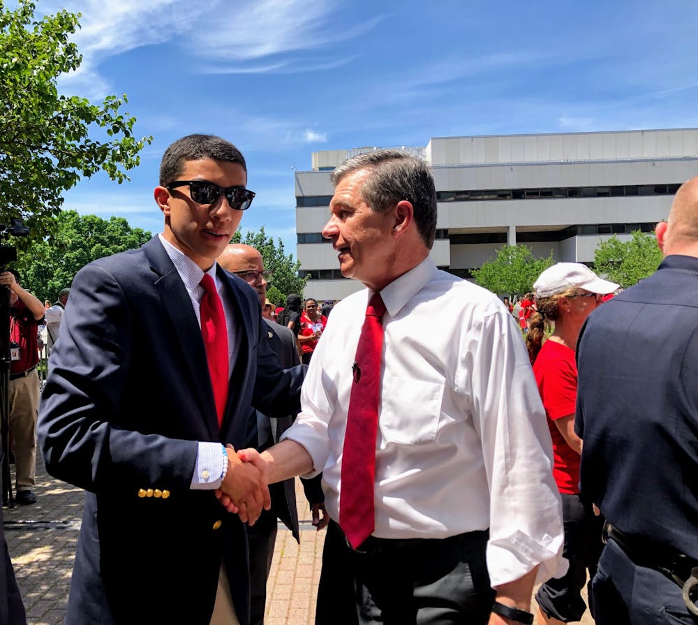 Greear Webb meets with Gov. Roy Cooper on May 1, 2019 at the Red 4 Ed NC Education Rally in Raleigh. Photo courtesy of Greear Webb. 