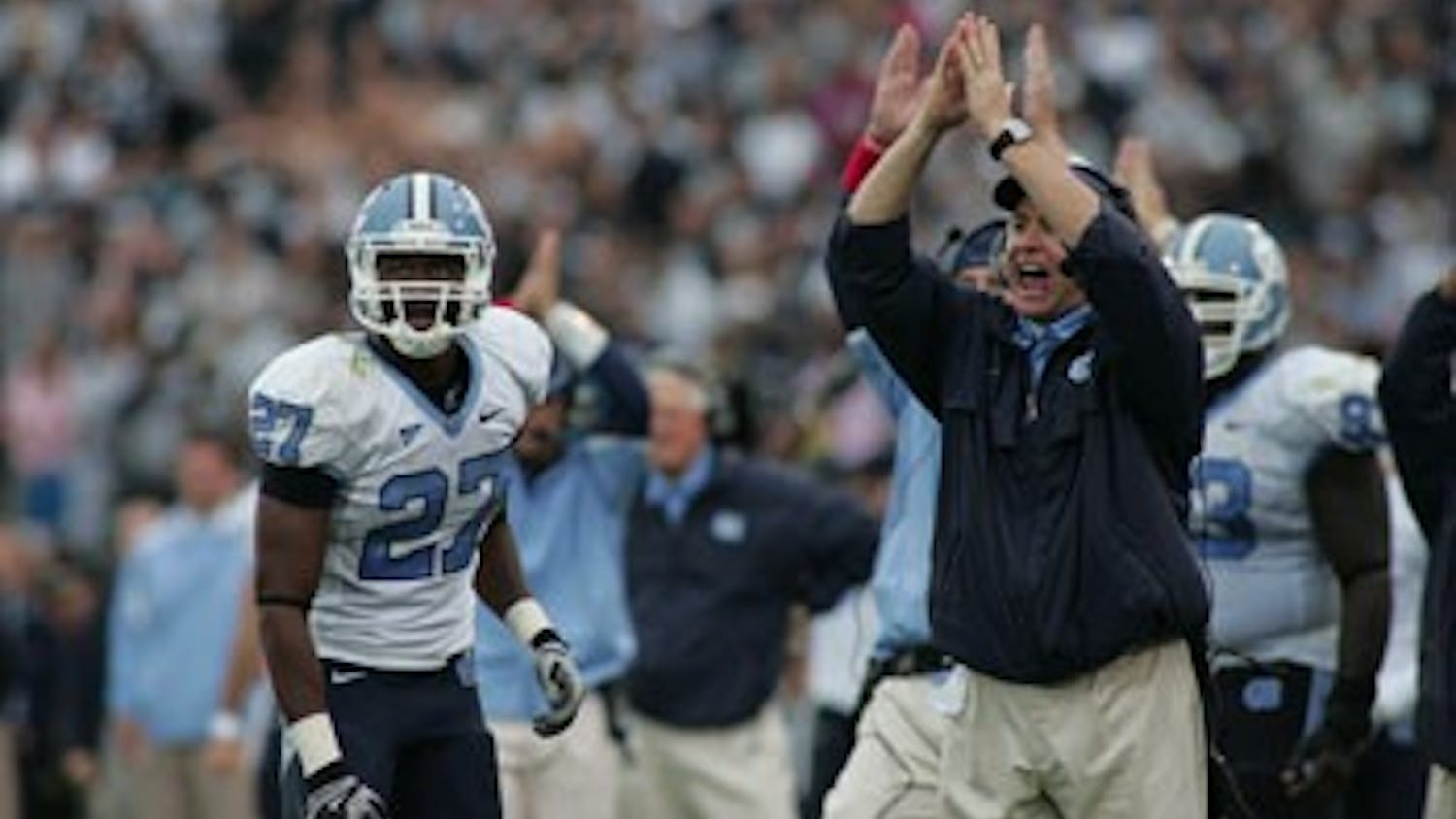 UNC safety Deunta Williams and head coach Butch Davis react to the game-winning safety.