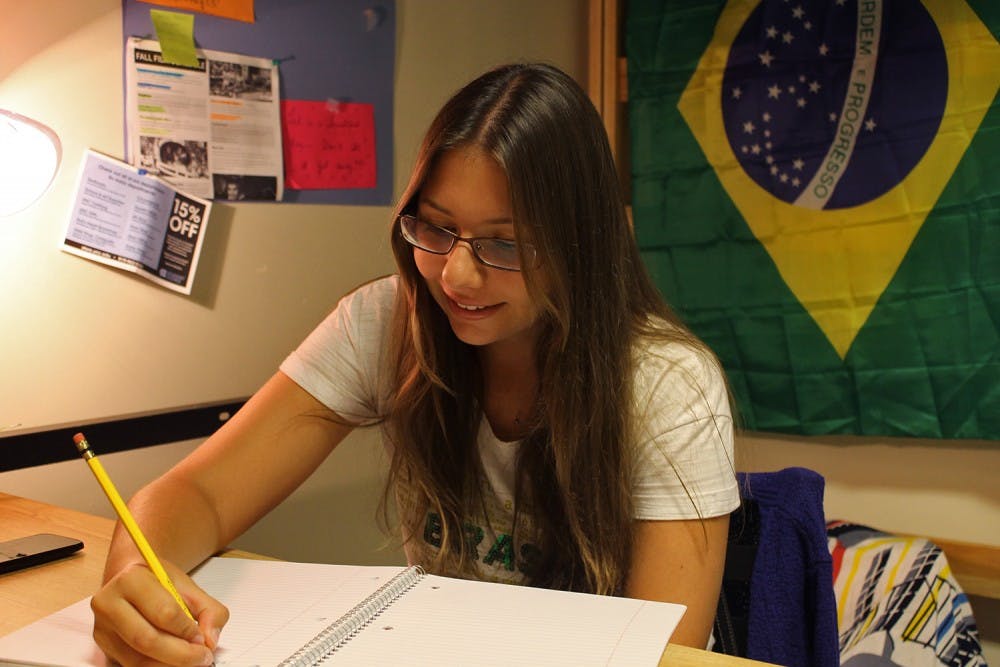 UNC exchange student Rafaela Granzotti, from Brasil, studyies in her dorm room in Aycock. 