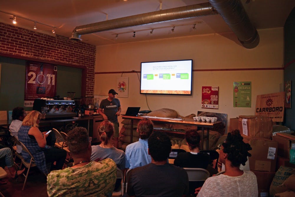 Scott Conary, president of the Carrboro Coffee Roasters, introduces the Gender in Coffee documentary with a short presentation on the coffee industry. 
