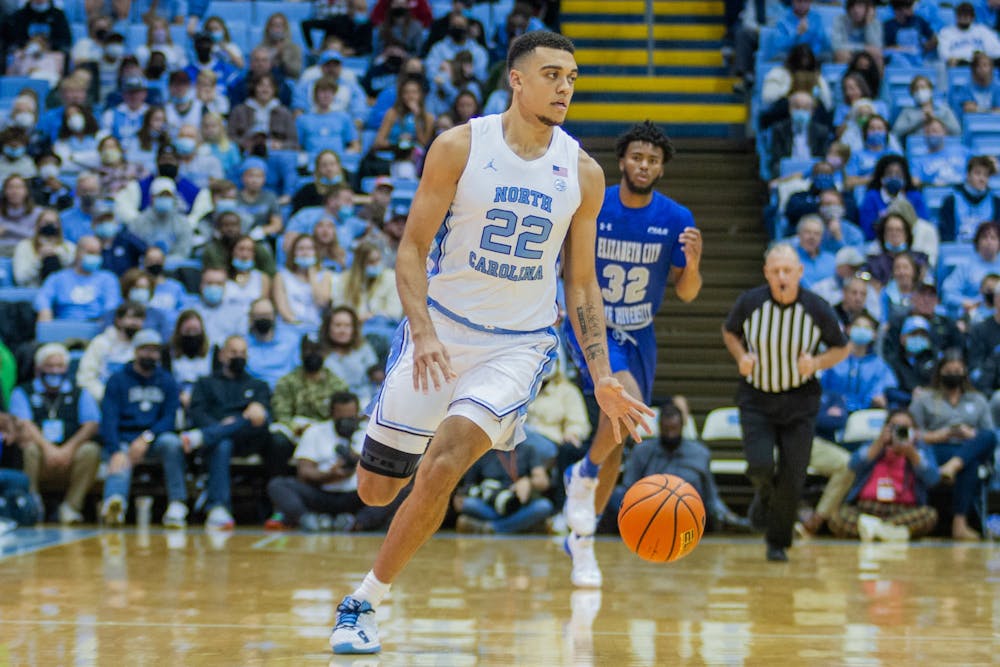 Junior forawrd Justin McKoy (22) runs with the ball at the exhibition game against Elizabeth City State on Nov. 5 at the Dean E. Smith Center. UNC won 83-55.
