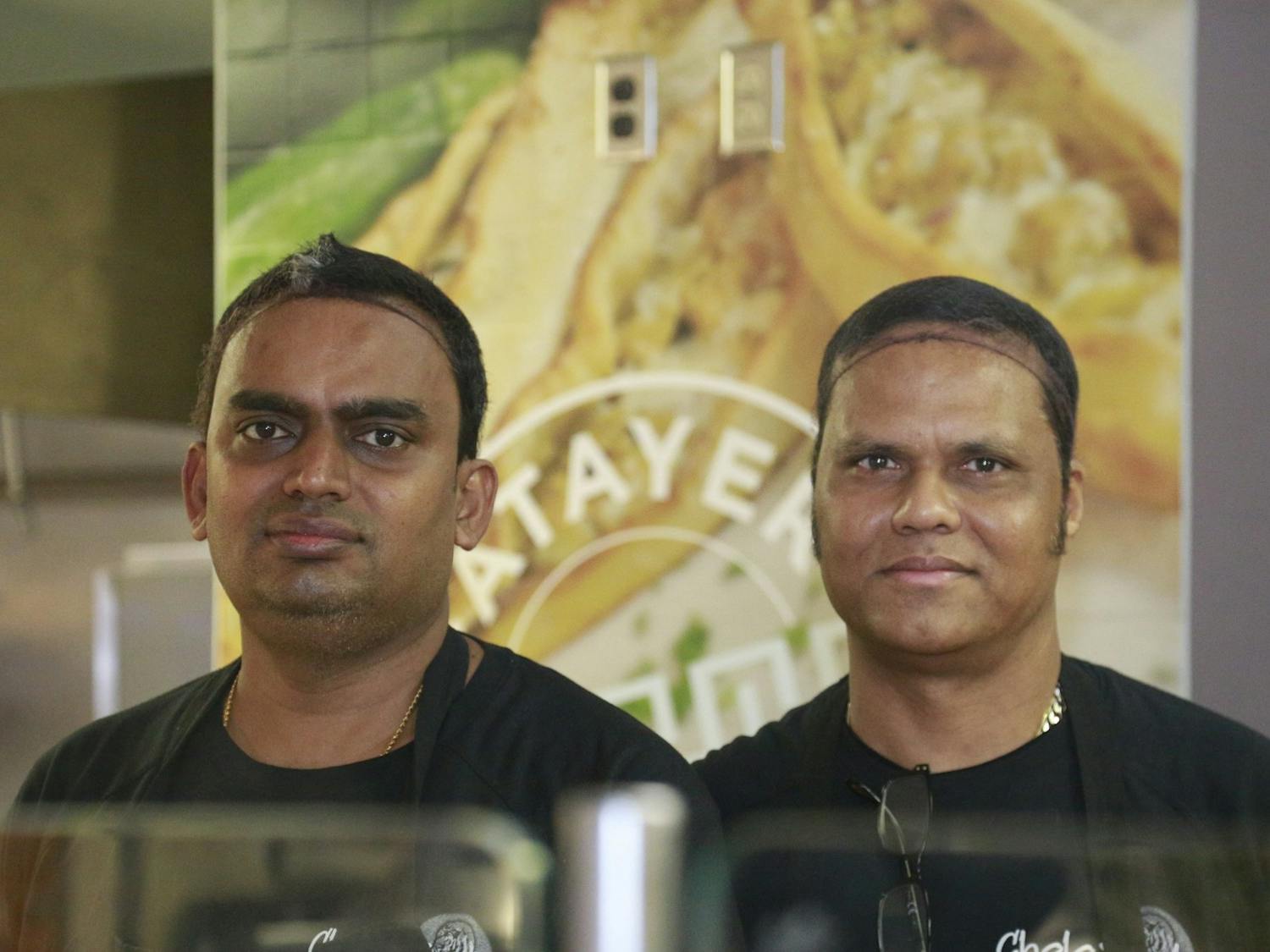 Wednesday morning on Februrary 5, 2020, Raja and Durai prepare to open CholaNad, a restaurant in the bottom of Lenoir. They are from Tamil Nadu, a region that inspires many CholaNad dishes.