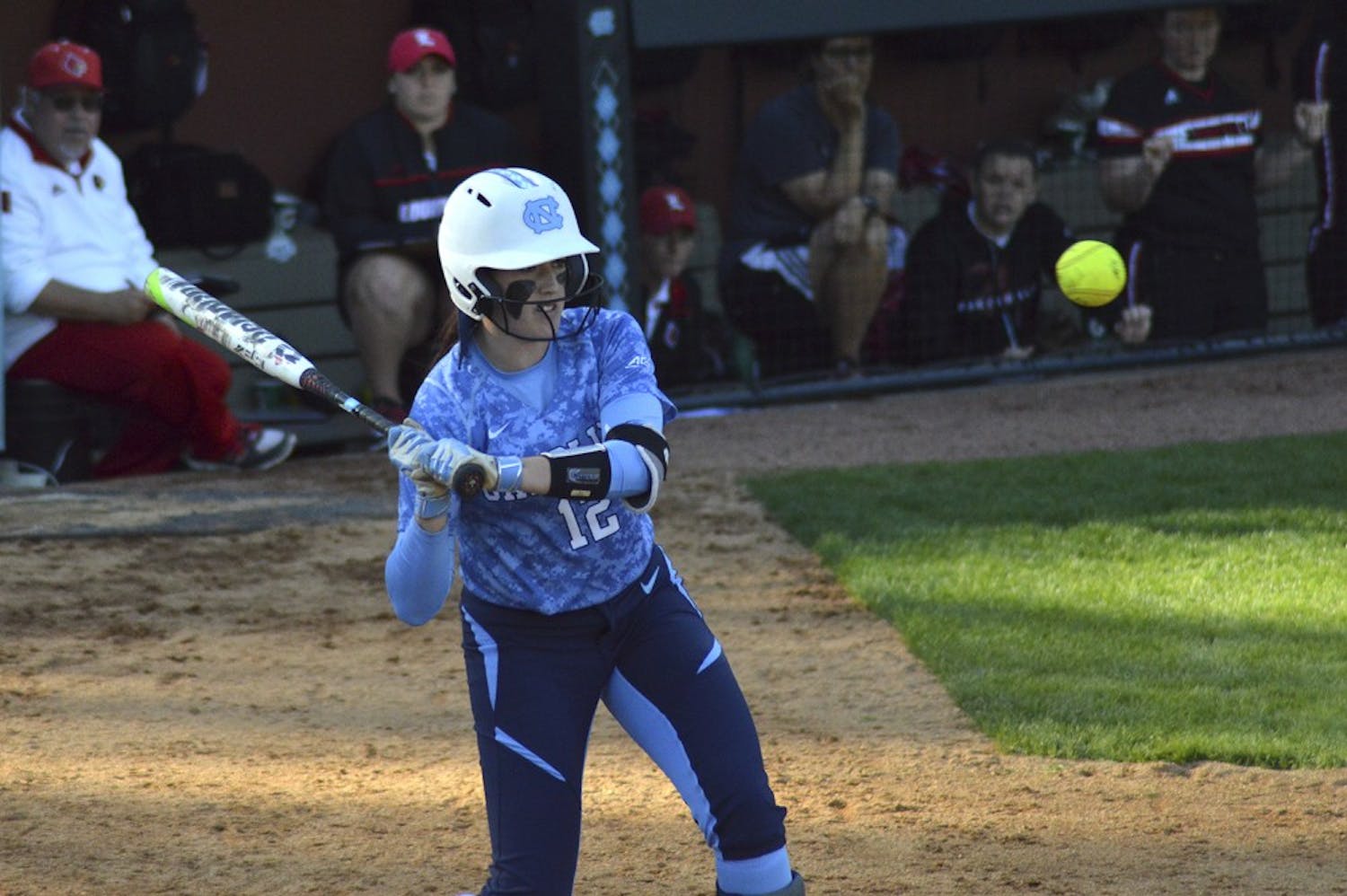 Shortstop Kristen Brown swings at the ball during UNC's game against Louisville on Saturday.