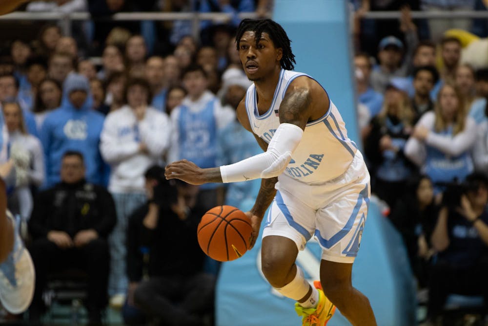 <p>UNC junior guard Caleb Love (2) drives toward the basket in the game against Notre Dame in the Dean Smith Center on Jan. 7, 2023.</p>