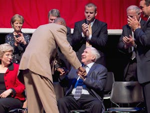 Charlie Scott embraces former North Carolina coach Dean Smith, who was honored with the Dr. James A. Naismith Good Sportsmanship Award Wednesday, June 29, 2011 at Memorial Auditorium in Raleigh, North Carolina. (Robert Willett/Raleigh News &amp; Observer/MCT)