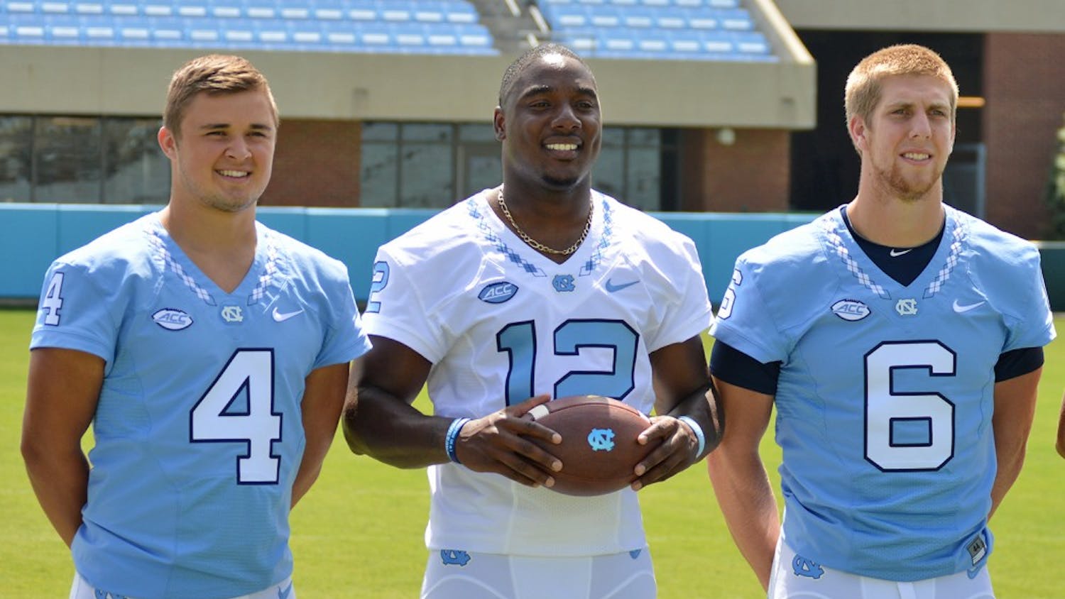 Marquise Williams (12) poses for a photo with fellow teammates at Media Day. 