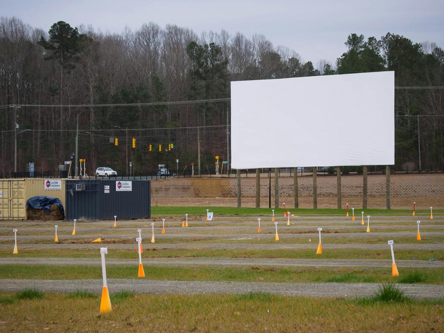 The large screen overlooks parking spots at The Drive-In at Carraway Village on Wednesday, Feb. 10, 2021. The Drive-In features classic movies and special series from Film Fest 919.