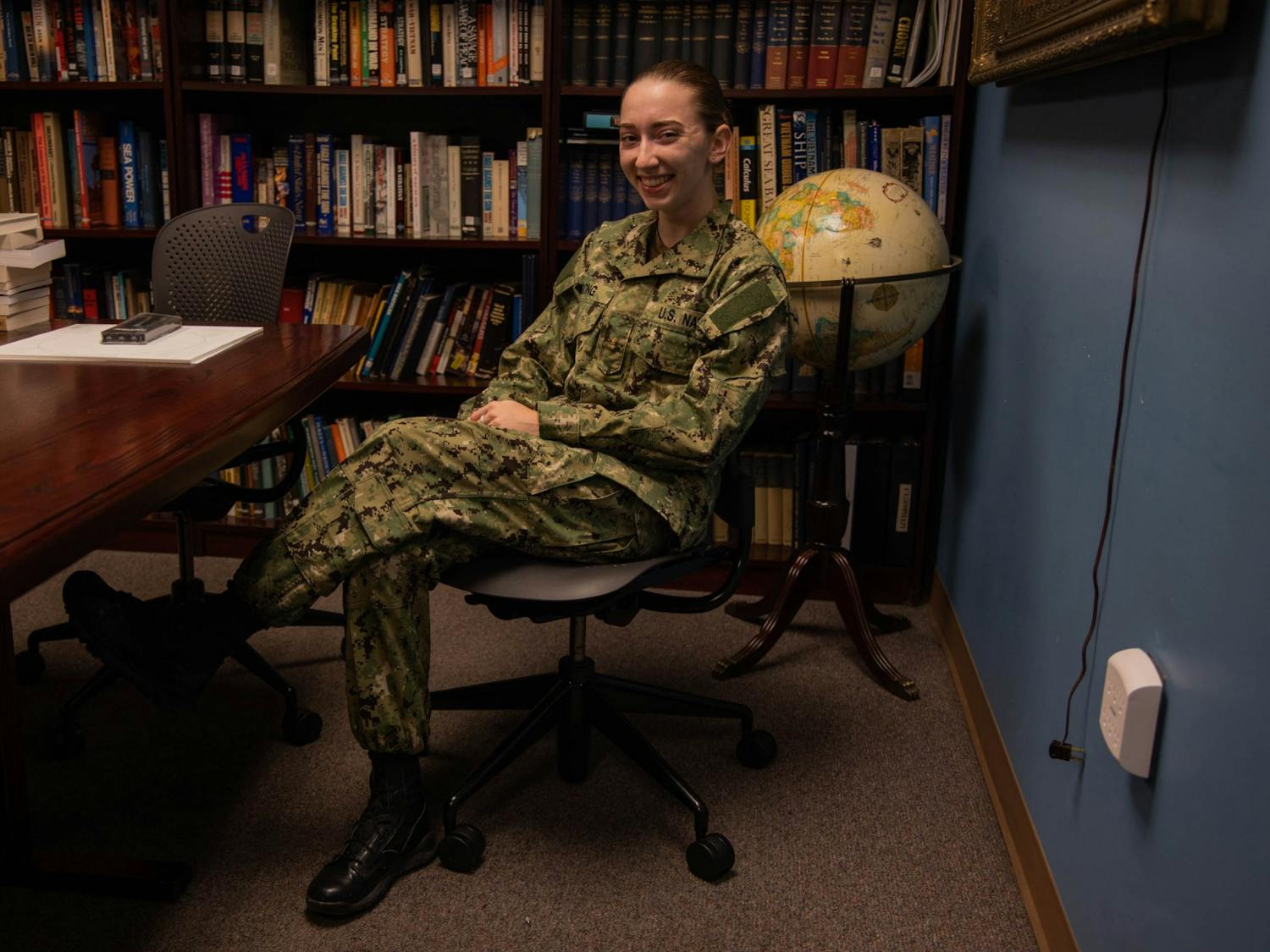 Katy Strong, a senior midshipman at the UNC Naval ROTC, poses for a portrait in the ROTC Armory on Thursday, Oct. 29, 2020. After graduation, Strong will complete her Naval Introductory Flight Evaluation, at the Naval Air Station Pensacola.
