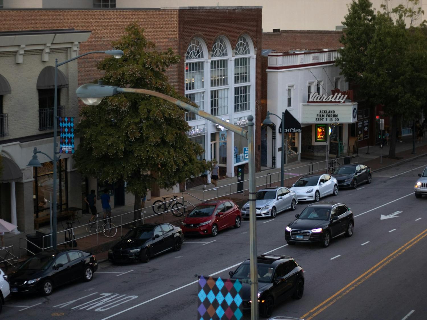Cars passing by on East Franklin Street in Chapel Hill, North Carolina. Pictured on Monday, Sept. 19, 2022.