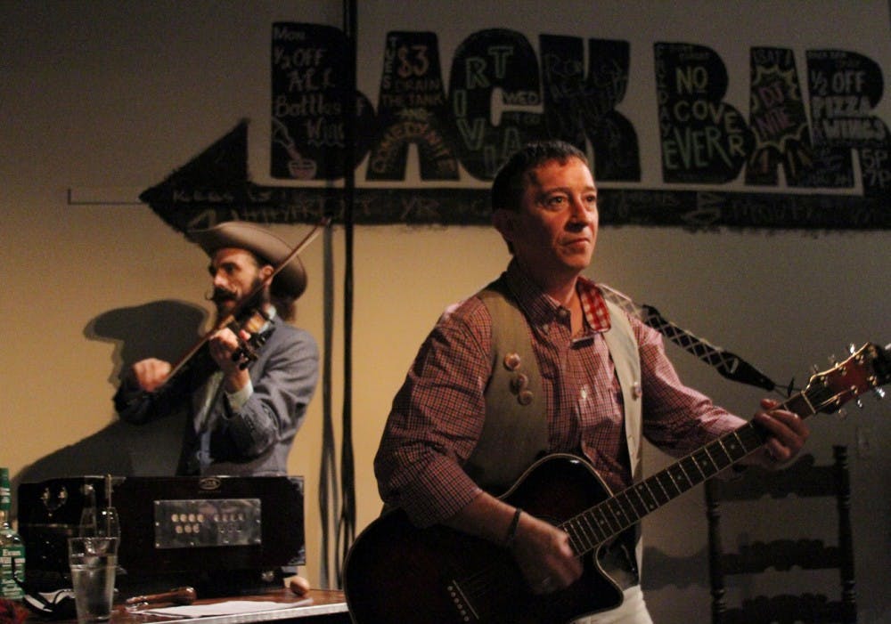	<p>David McKay (right) and Alasdair Macrae perform in The National Theatre of Scotland’s play, “The Strange Undoing of Prudencia Hart” at Back Bar.</p>