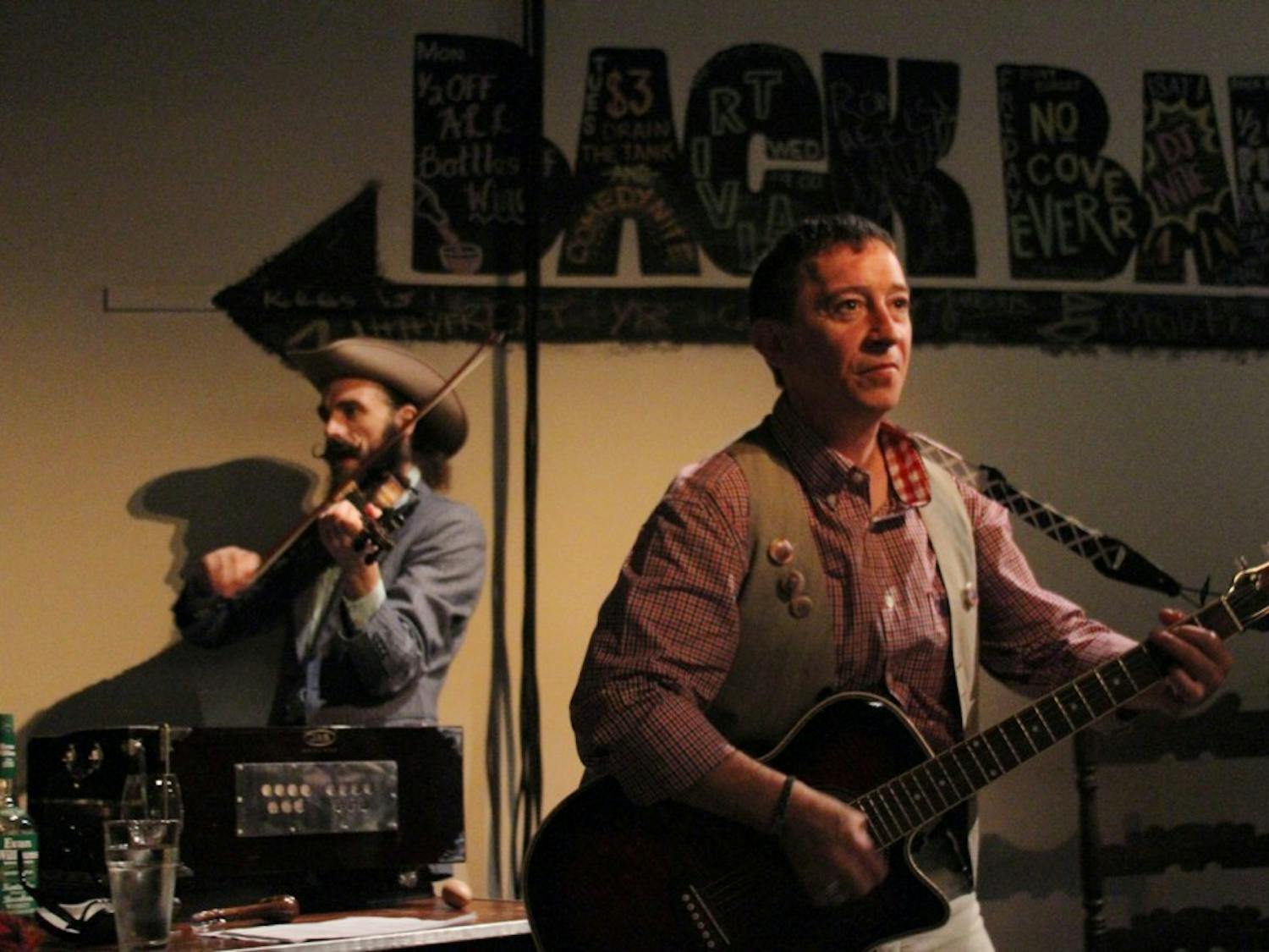 	David McKay (right) and Alasdair Macrae perform in The National Theatre of Scotland’s play, “The Strange Undoing of Prudencia Hart” at Back Bar.