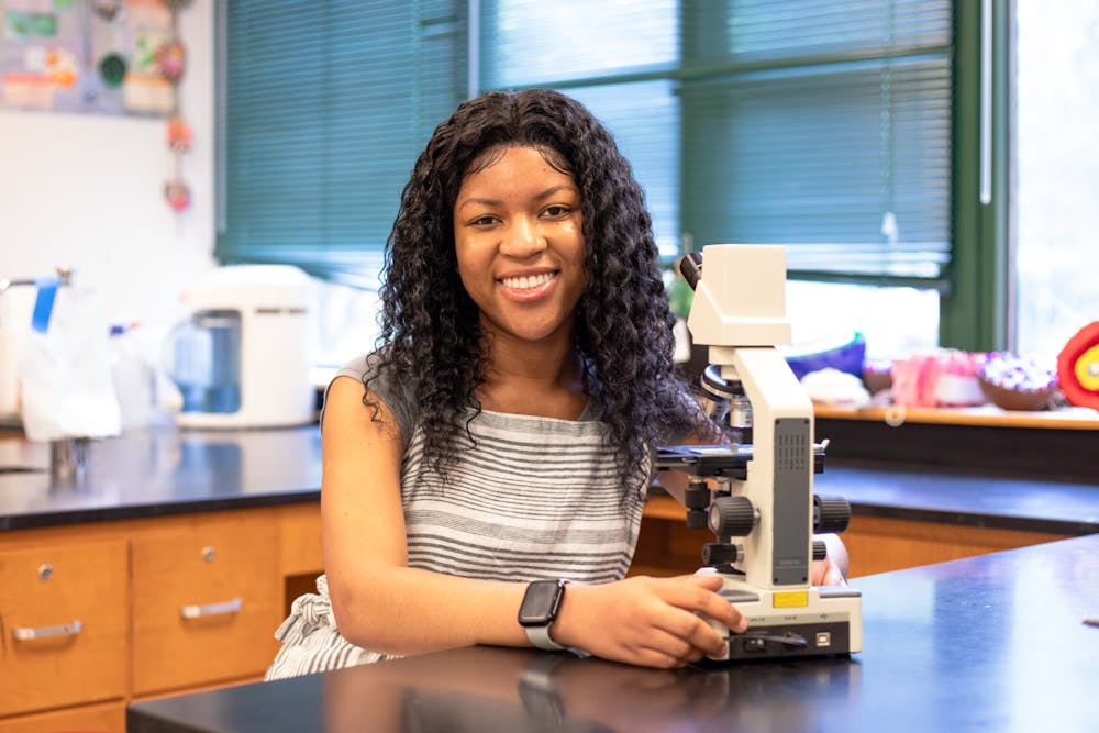 <p>Pristine Onuoha, an 11th-grade student at East Chapel Hill High School, poses for a portrait at East Chapel Hill High School on May 24, 2022. Onuoha is one of five national finalists in the Genes in Space challenge.</p>