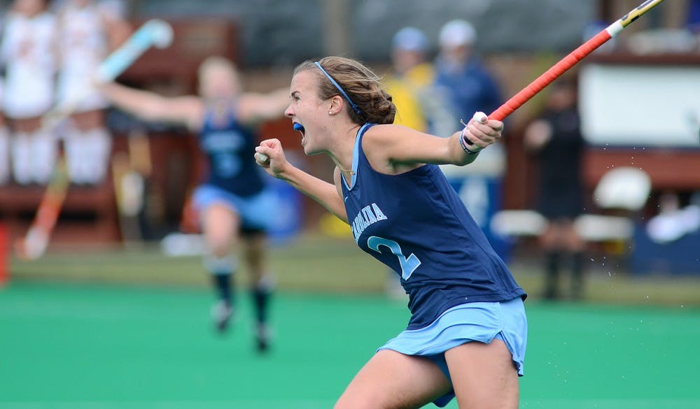 	<p>Sophomore Loren Shealy celebrates her second goal of the game. Shealy scored on an empty net in the final minute to ice the game for <span class="caps">UNC</span>.</p>