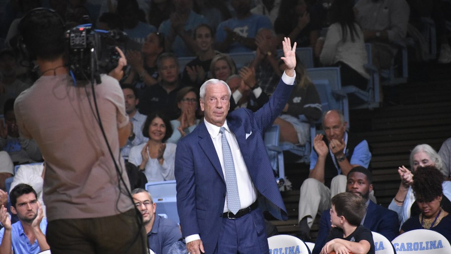 UNC men's basketball head coach Roy Williams waves to the crowd during Late Night with Roy on Oct. 12 at the Smith Center.