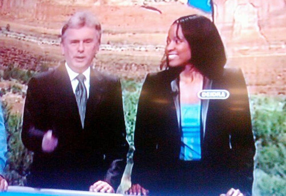 	<p>Deidra Debnam (right) talks with Pat Sajak, the host of Wheel of Fortune, as a contestant on the show. Photo Courtesy of Deidra Debnam</p>