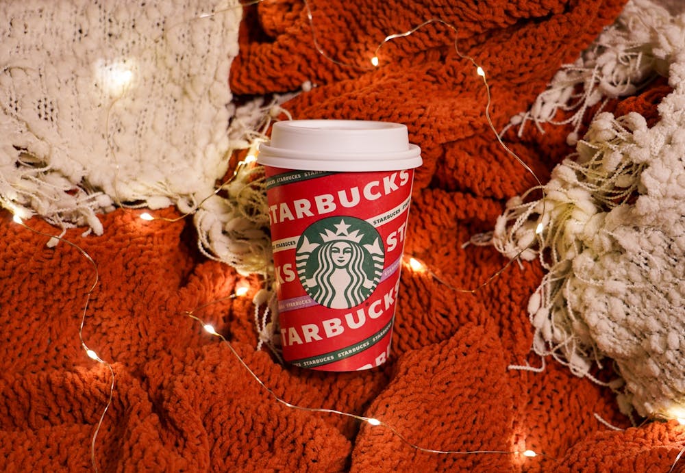 <p>DTH Photo Illustration. With winter weather rapidly approaching, Starbucks is rolling out their annual seasonal drinks, ringing in the holidays with cups featuring new festive designs.&nbsp;</p>