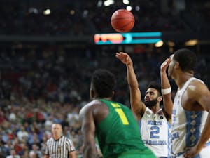 North Carolina guard Joel Berry (2) shoots one of two free throws in the final seconds of the game. With a 1-point lead Berry missed both shots after forward Kennedy Meeks (3) missed both of his just moments before.