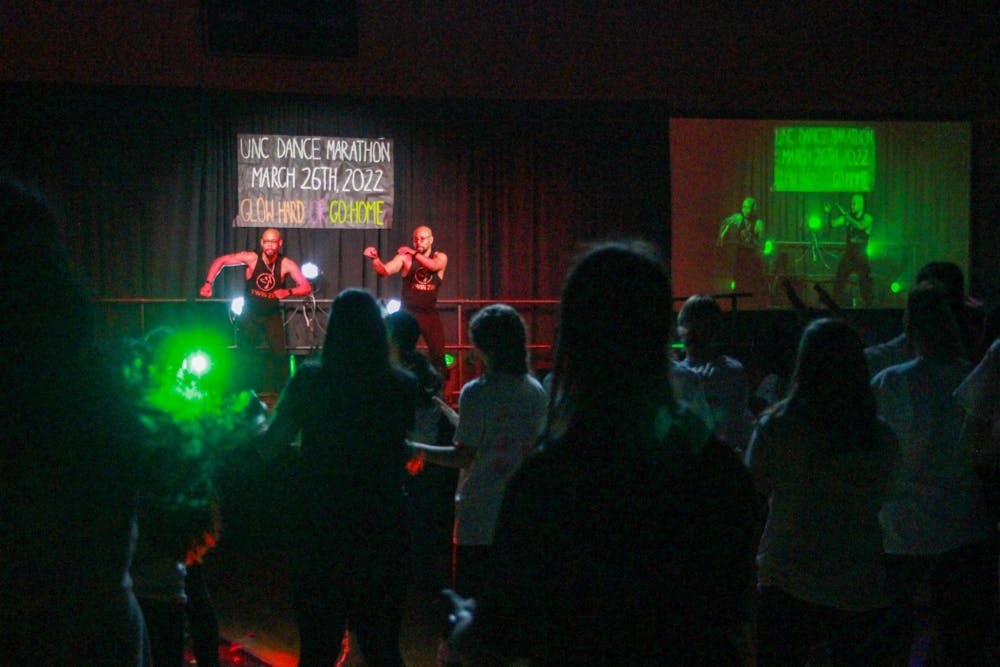 Students dance along with Twin Zim Zumba during the Carolina For The Kids Dance Marathon on Saturday, March 26, 2022, at Fetzer Hall. The non-profit organization held a 12-hour dance event to raise money for UNC Children's Hospital.