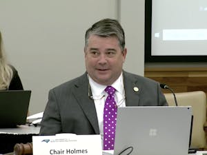 Chairperson James Holmes Jr. speaks at the Board of Governors' Committee on Budget and Finance meeting on Wednesday to address fundings allocated for COVID-19, adjustments for tuition for in-state and out-of-state students next year and school fees.&nbsp;