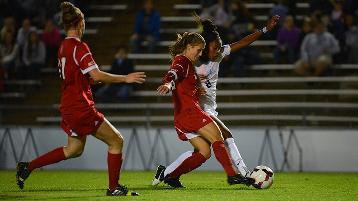 	Freshman forward Amber Munerlyn goes after the ball in a Thursday night win against N.C. State.
