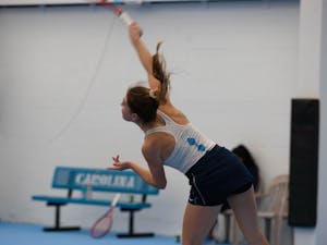 UNC Junior Fiona Crawley returns a shot during the Tar Heel 4-0 victory over the Maryland Terrapins in the women's tennis matches on Friday, Jan 27 2023 at The Cone-Kenfield Tennis Center.