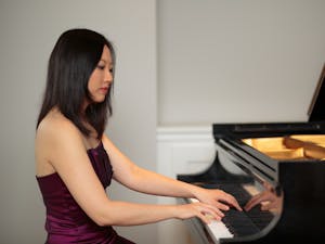 Clara Yang, Associate Professor of Piano and Head of Keyboard Studies at UNC-Chapel Hill, plays the piano. Photo courtesy of Clara Yang.