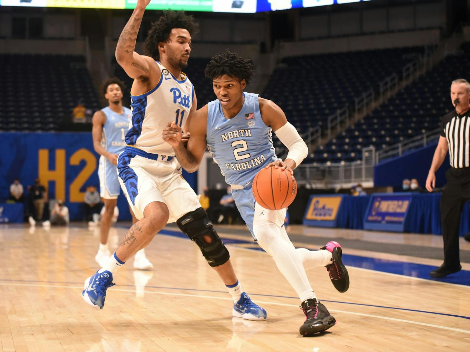 UNC first year guard Caleb Love (2) drives toward the basket during a game against Pitt on Tuesday, Jan. 26, 2021. UNC beat Pitt 75-65. Photo courtesy of Matthew Hawley. 