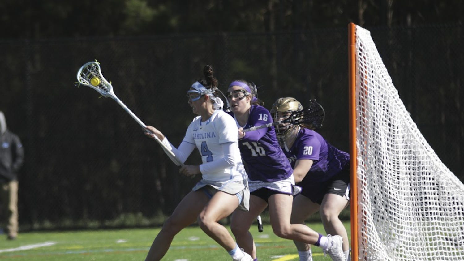 UNC midfielder (4)&nbsp;Marie McCool moves in the crease against James Madison on Saturday at Cardinal Gibbons High School in Raleigh.