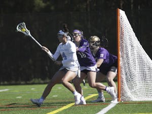 UNC midfielder (4)&nbsp;Marie McCool moves in the crease against James Madison on Saturday at Cardinal Gibbons High School in Raleigh.