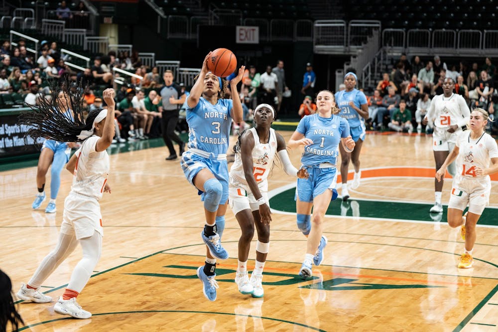 <p>UNC junior wing Kennedy Todd-Williams (3) shoots a layup in North Carolina's game at Miami on Thursday, Jan. 5, 2023. UNC fell to the Hurricanes, 62-58. Photo courtesy of UNC Athletic Communications.</p>