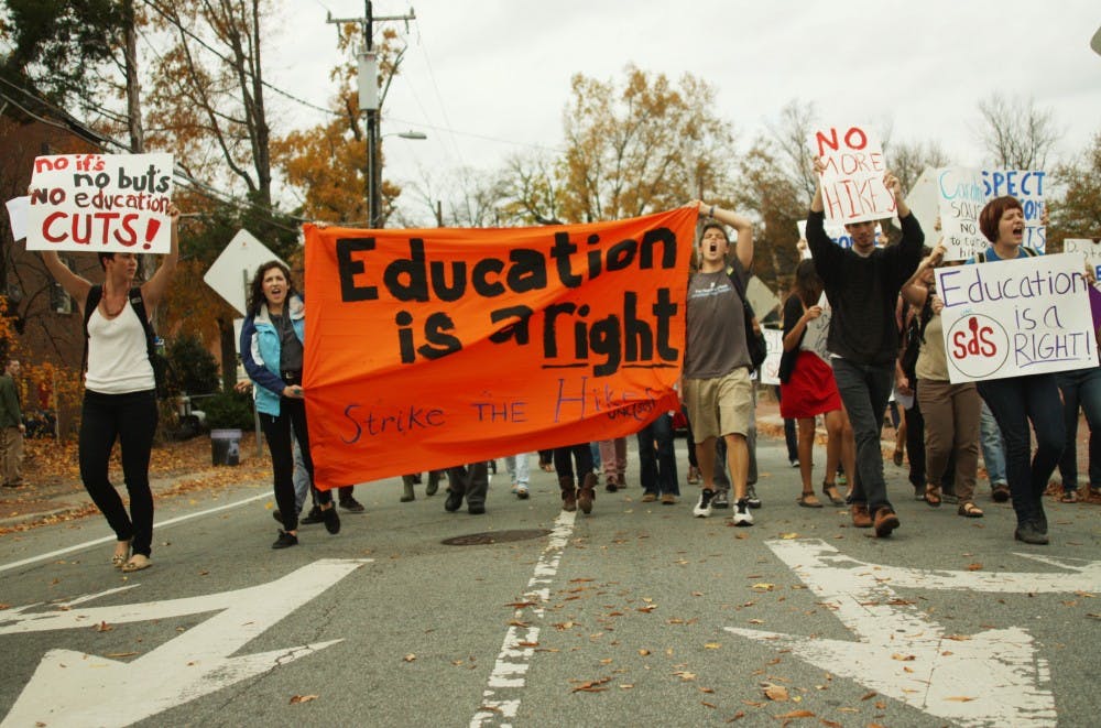 Student protestors gathered in the Pit on Wednesday and marched to The Carolina Inn for the Board of Trustees Meeting.  