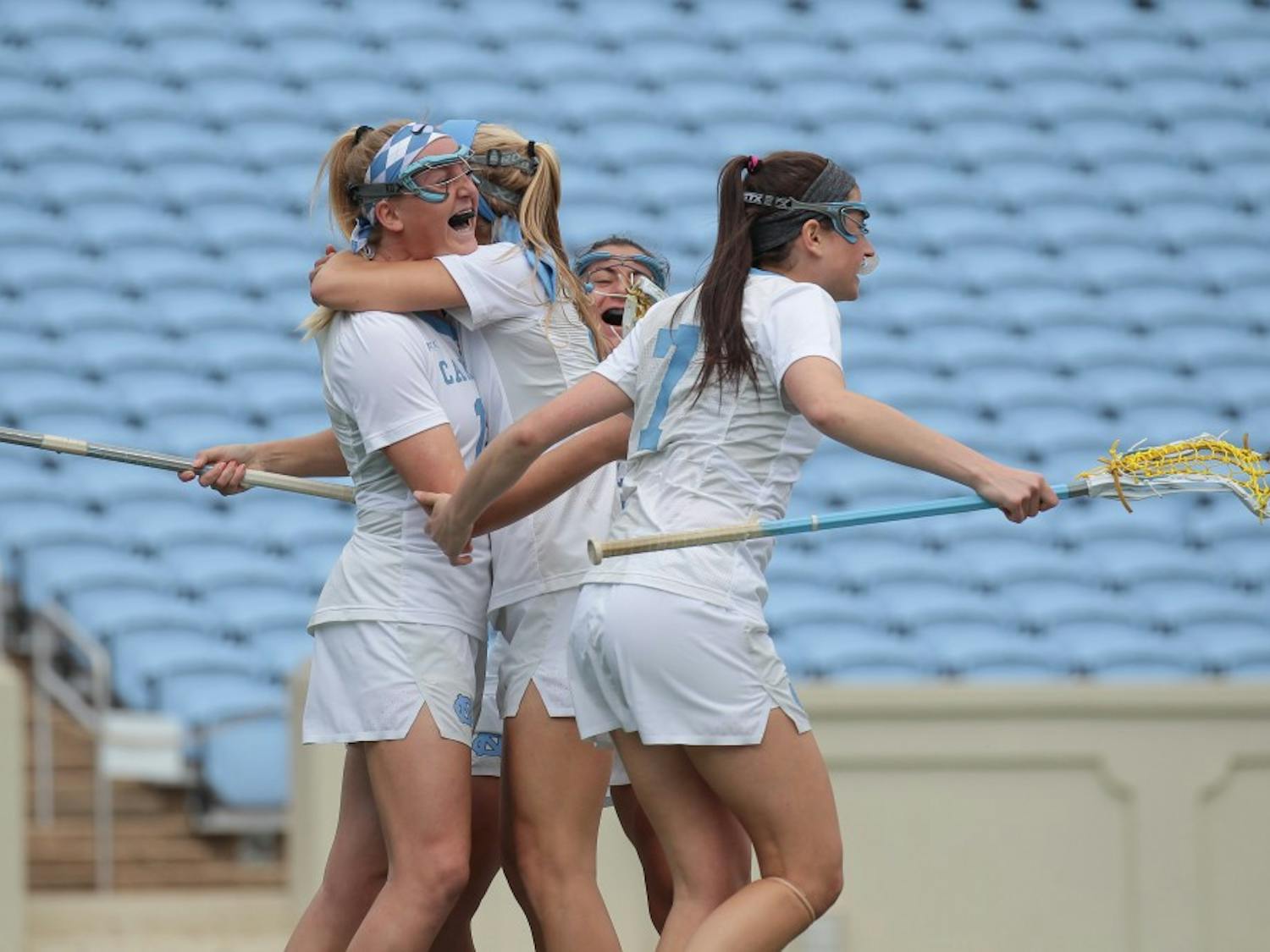 No. 8 UNC women's lacrosse celebrates a goal against no. 1 Maryland on Saturday, Feb. 24.