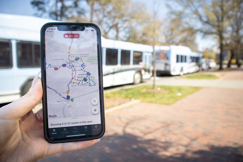 <p>DTH Photo Illustration. Chapel Hill Transit buses now have live tracking again. Riders can check bus locations in real-time using applications such as TransLoc.</p>