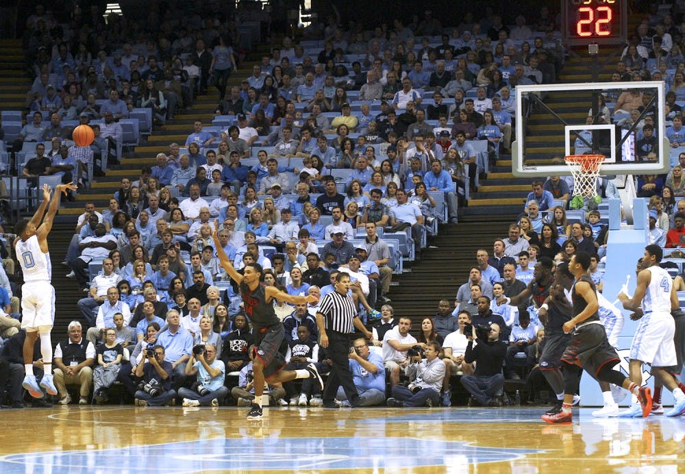 Guard Nate Britt (0) pulls up for a 3-pointer against Fairfield Sunday night. 