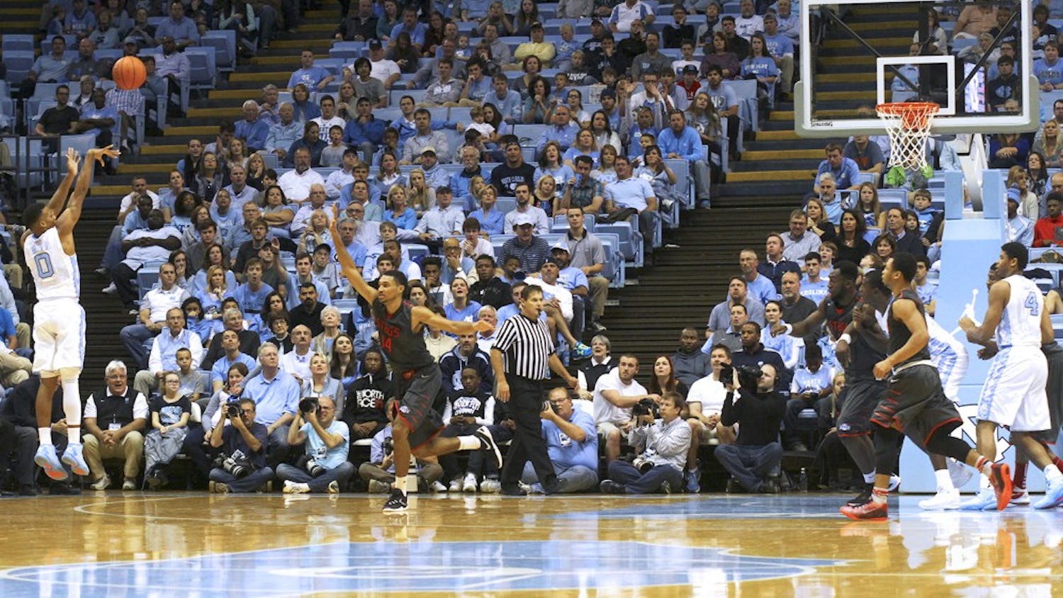 Guard Nate Britt (0) pulls up for a 3-pointer against Fairfield Sunday night. 