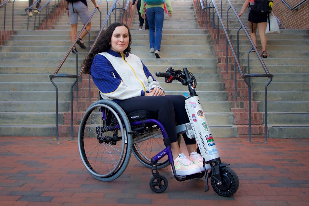 Laura Saavedra Forero, a freshman neuroscience major, poses for a portrait outside of UNC's Student Union on Oct. 26. "My life shouldn't be put at greater risk due to the University's sheer disregard for its disabled students," Saavedra said.