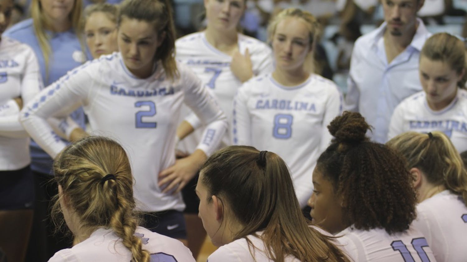 Volleyball huddles against LMU