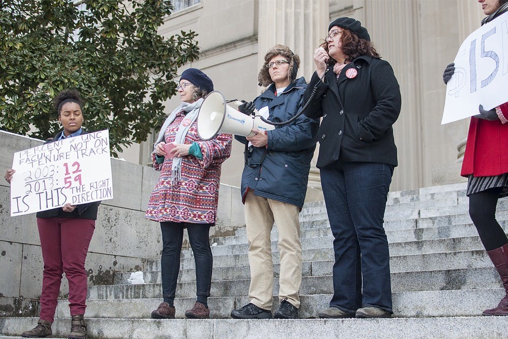 Didem Turkoglu (right), a teaching assistant and doctoral candidate in the sociology department, spoke at the rally Wednesday.