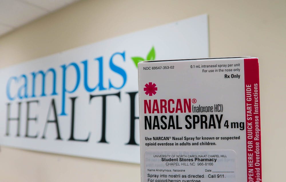 <p>DTH Photo Illustration. Narcan nasal spray, a form of Naloxone, is available at the UNC Campus Health pharmacy. The product is packaged with instructions and precautions.</p>