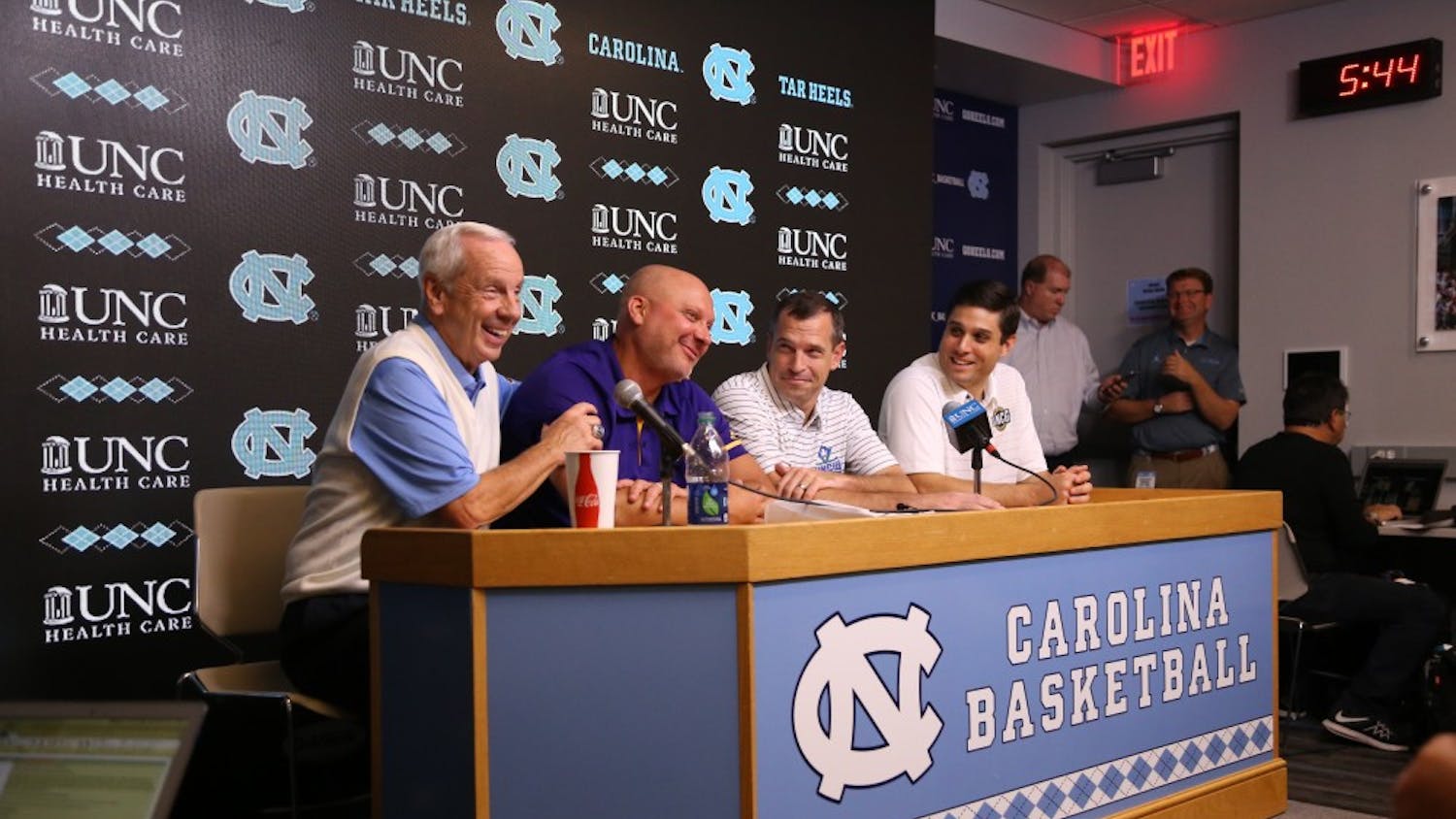 Roy Williams and old teammates/assistant coach