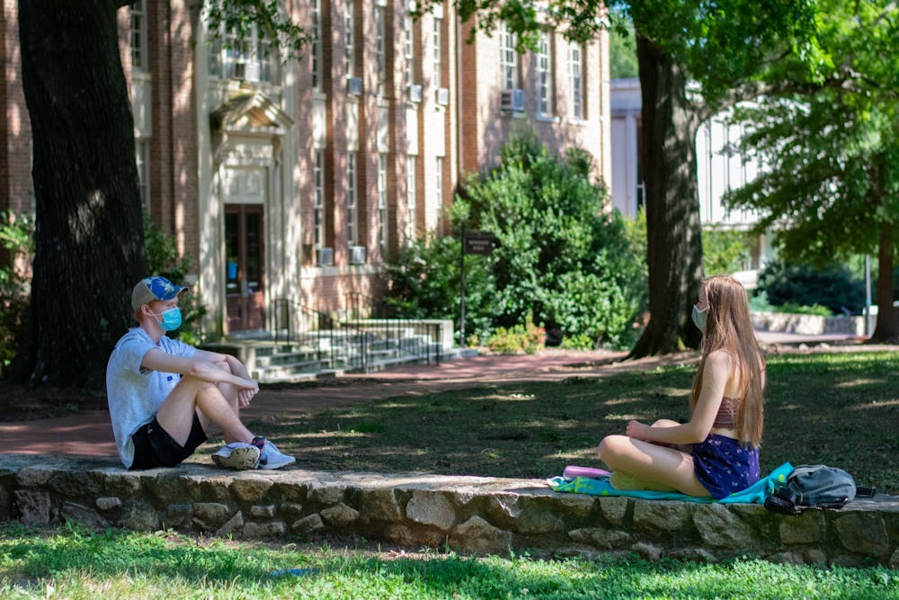 Students enjoy the outdoors while being social distant at Polk Place on Sunday, Sept. 6, 2020.