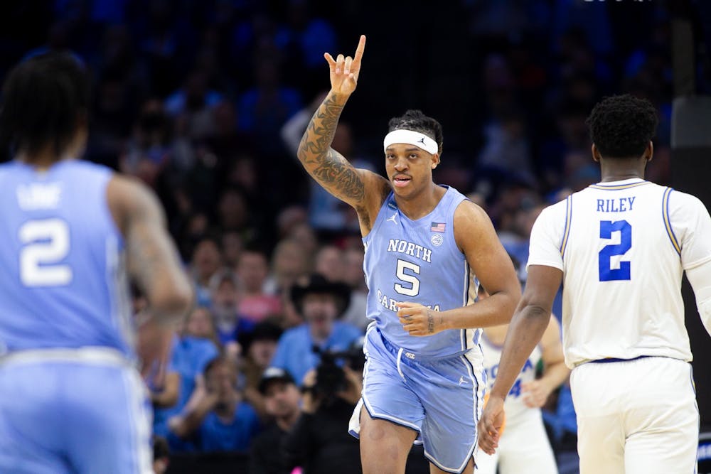UNC junior forward Armando Bacot (5) celebrates a crucial layup during the regional semifinals of the NCAA Tournament in Philadelphia, Penn., on Friday, March 25, 2022. UNC won 73-66.