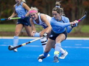 UNC senior Erin Matson (1) goes for a hard drive during a field hockey game against Duke on Saturday, Oct. 29, 2022, at Jack Katz Stadium in Durham, N.C.