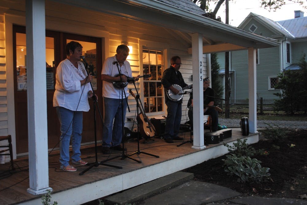 	<p>Raven Ridge perform on the front porch of TableNC. </p>
