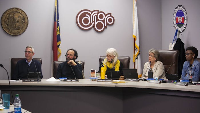 (From left) Town Council Members Damon Seils, Sammy Slade, Randee Haven-O'Donnell and Barbara Foushee and Mayor Lydia Lavelle listen to an ENO Arts Mill proposal in West Hillsborough on Tuesday, Feb. 4, 2020 at the Carrboro Town Hall.&nbsp;