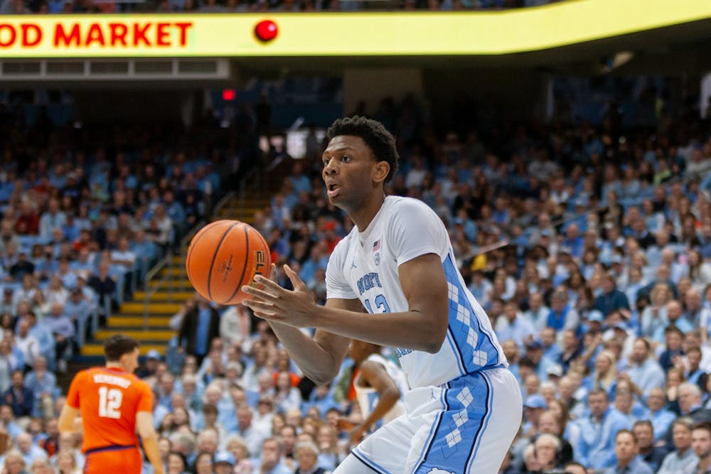 <p>UNC first-year forward Jalen Washington (13) catches the ball during the men's basketball game against Clemson at the Dean Smith Center on Saturday, Feb. 11, 2023. UNC beat Clemson 91-71.</p>