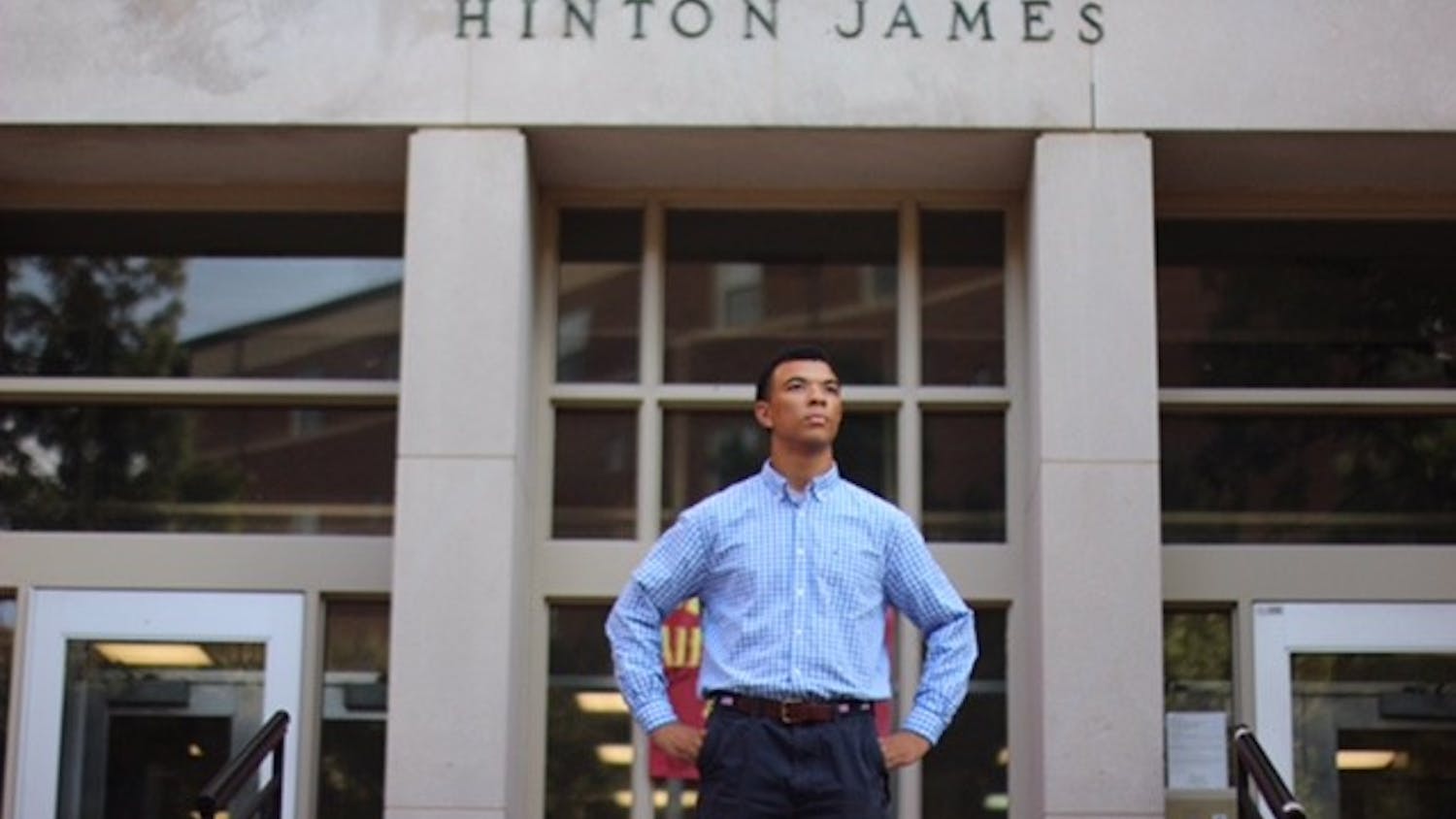 Tarik Woods, a first-year, poses in front of the Hinton James dorm.Photo courtesy of Tarik&nbsp;Woods