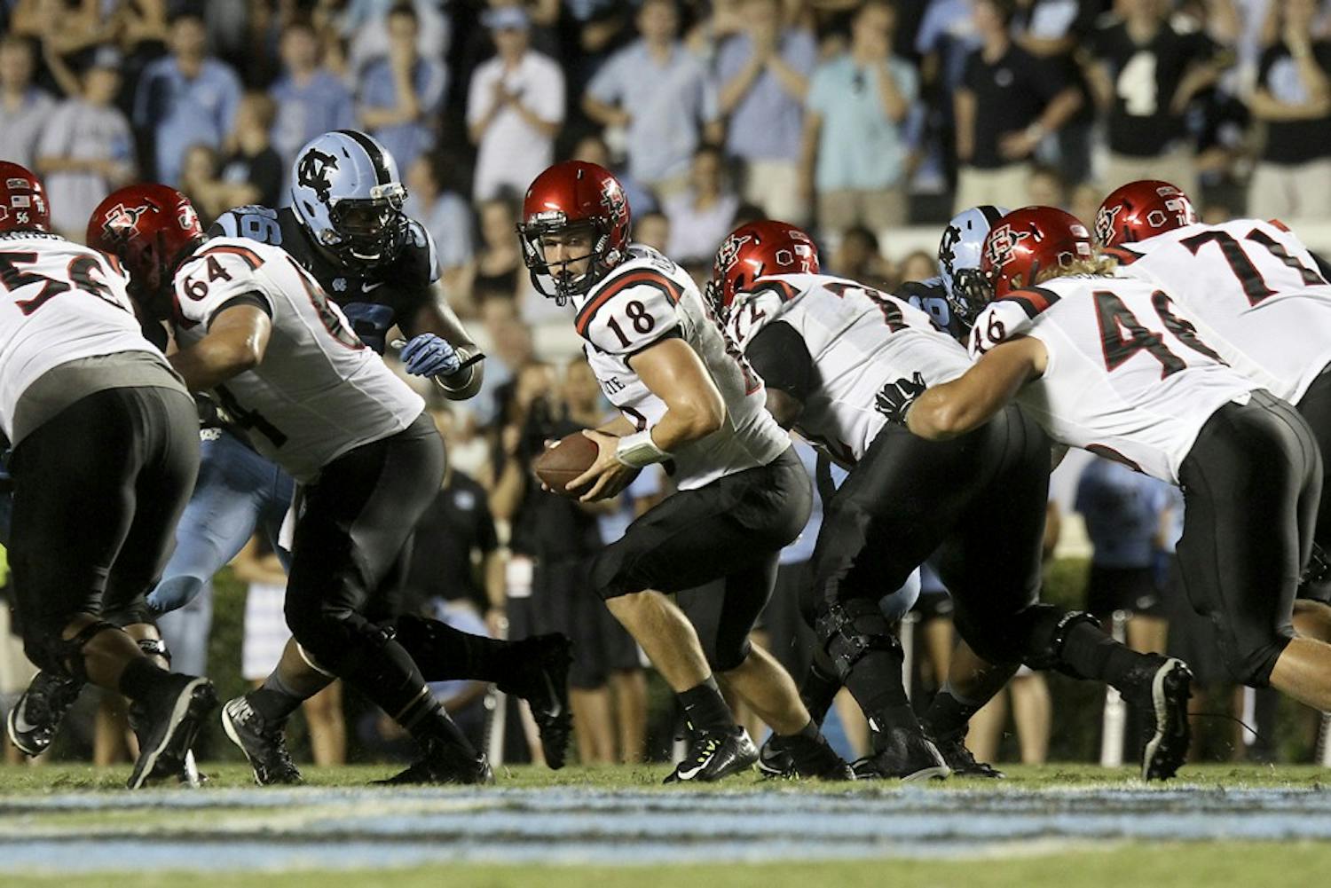 North Carolina defensive tackle Ethan Farmer (96) penterates a gap against San Diego State. Farmer is the only returning starter on the line from 2013.